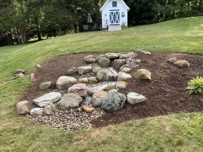 Ponds, pondless water features, fountainscapes, and high-end aquatic landscaping for Massachusetts and beyond