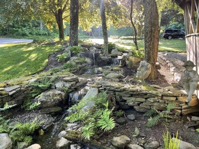 Ponds, pondless water features, fountainscapes, and high-end aquatic landscaping for Massachusetts and beyond
